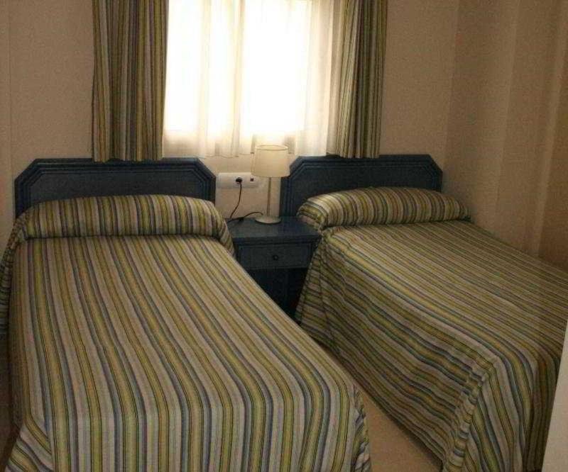 Фото Apartamentos Larimar