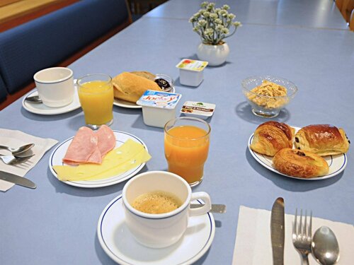 Гостиница Hôtel Roi Soleil Mulhouse Sausheim в Тане-Гебвиллере