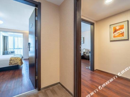 Фото Qingdao Housing International Hotel