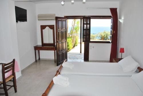 Фото Ostria Apartments