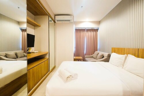Апартаменты Best Furnished Studio @ Grand Kamala Lagoon Apartment в Бекаси