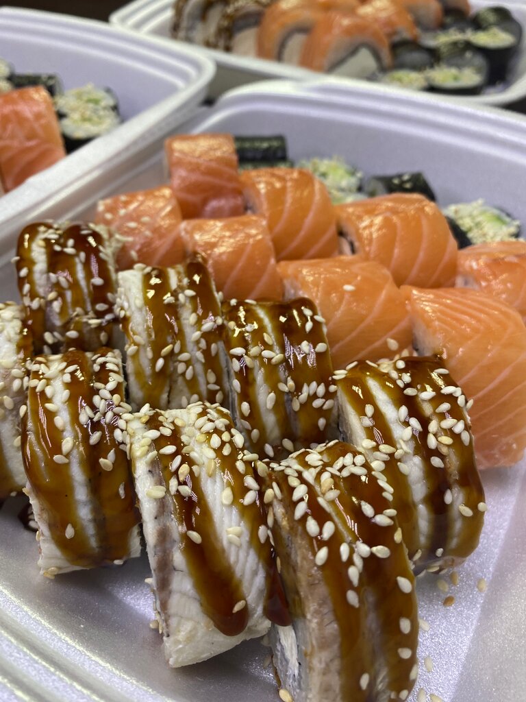 Food and lunch delivery Wasabi sushi rolly pizza, Gubakha, photo