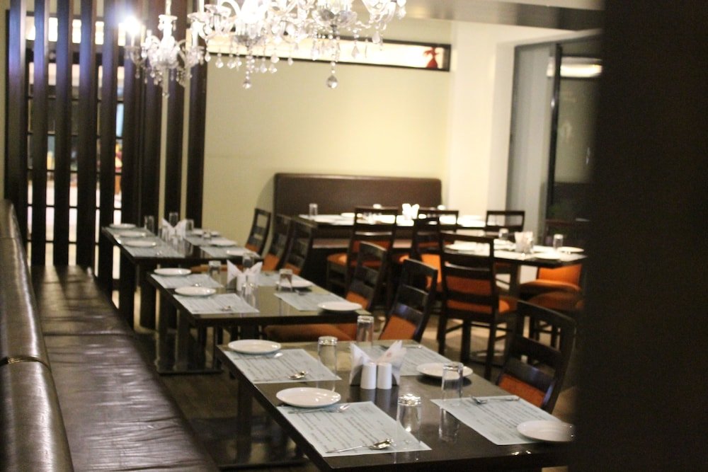 Фото Krishna Inn - The Green Hotel