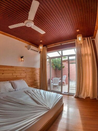 Гостиница New Breeze Thoddoo Inn на Тодду