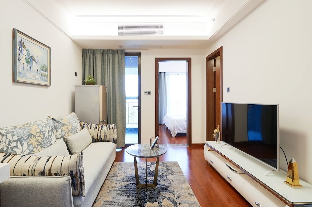 Фото Shen Gang Executive Apartment-Long Hua