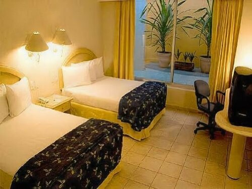 Гостиница Plaza Inn Express в Тапачуле