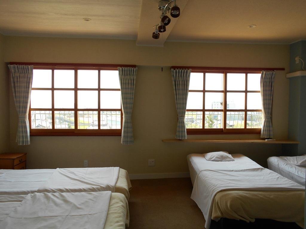 Фото Gamagori Orange Pension