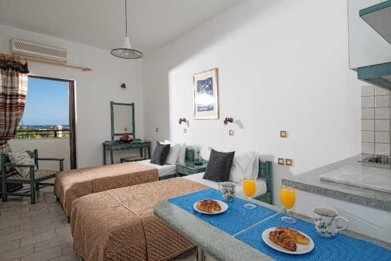 Фото Sunshine Studios & Apartments