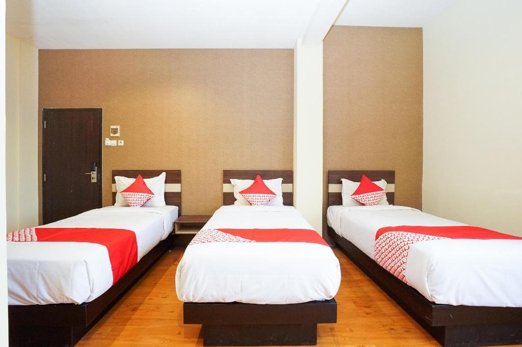 Фото Oyo 283 Helvetia Residence