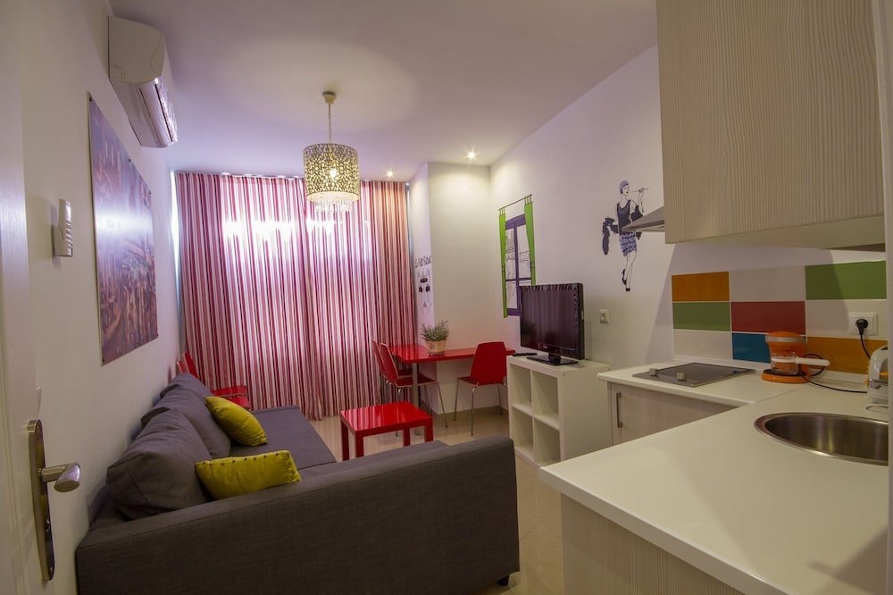 Фото Apartamentos El Templo Suites