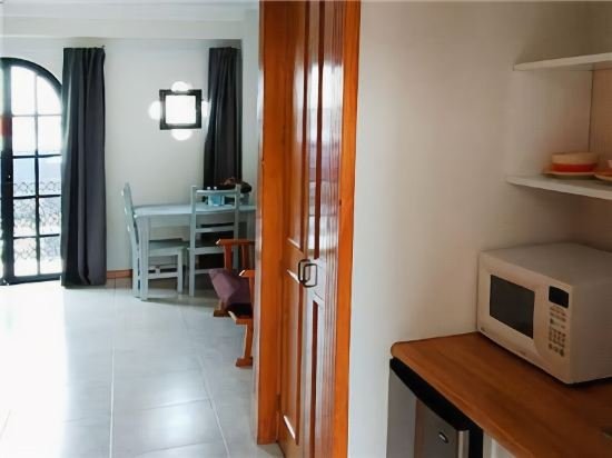 Фото Suites Sevilla