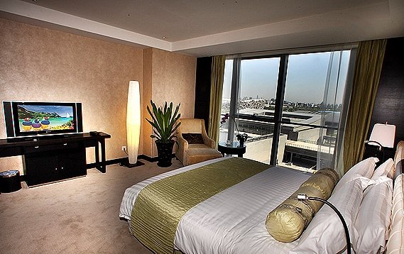 Фото China National Convention Center Grand Hotel