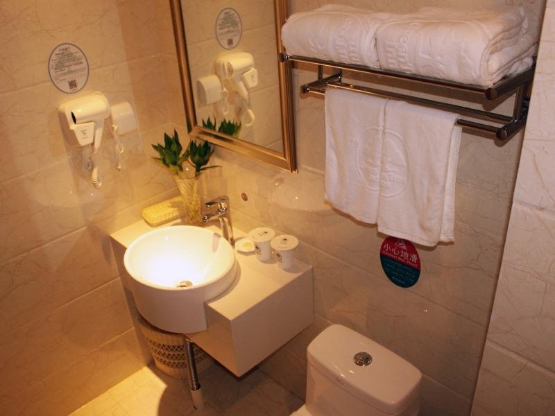 Фото GreenTree Inn Tianjin Xiqing District Xiuchuan Road Sunshine 100 Express Hotel