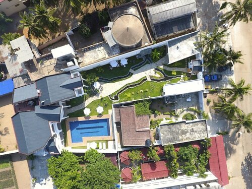 Гостиница Hotel Petit Brussel в Ломе