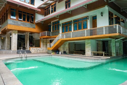 Гостиница Oyo 1209 Tirtasari Nice Guesthouse в Провинции Западная Ява