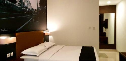 Фото Snooze Guesthouse Yogyakarta - Hostel