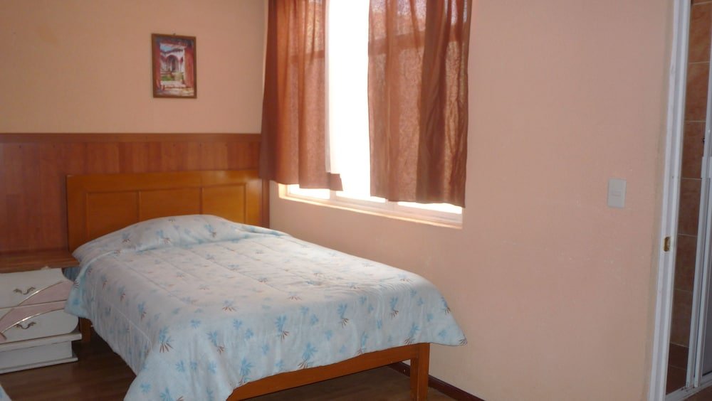 Фото Hostal Quinto Sol