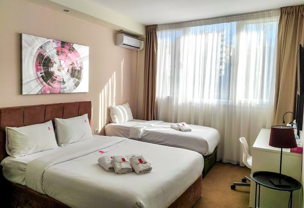 Фото City Plaza Apartments & Rooms