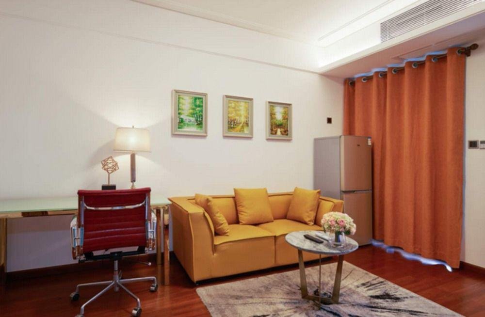 Фото Shen Gang Executive Apartment-Long Hua