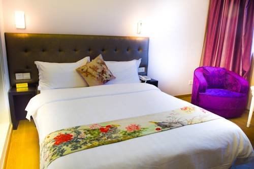 Фото Shenzhen New World Metro Grand Hotel