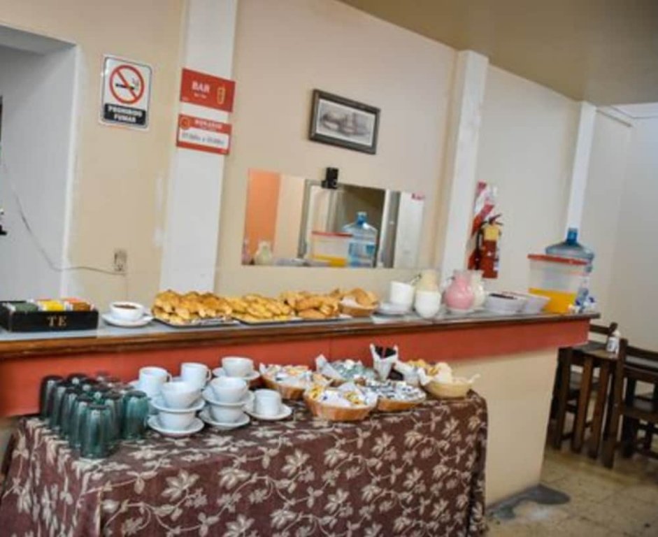 Фото Casi Guemes Hotel