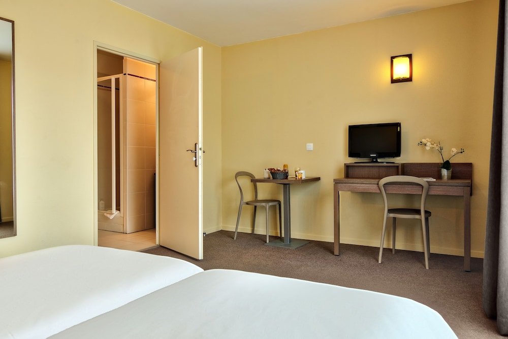 Фото Zenitude Hôtel - Résidences Magny les Hameaux