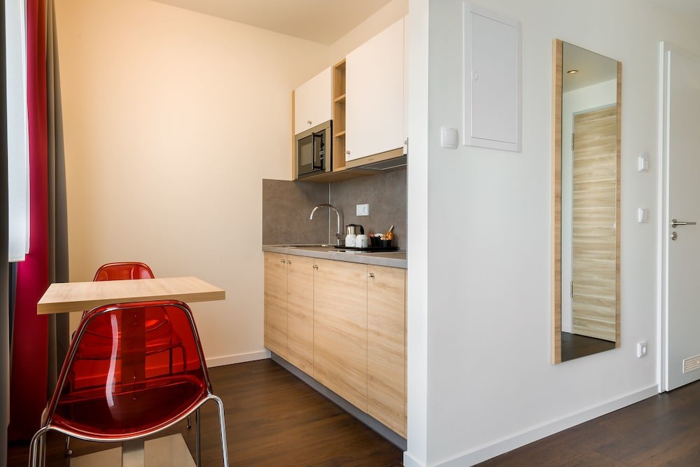 Фото Signature East Hotel Apartment