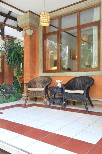 Фото Puri Naga Beachfront Cottages