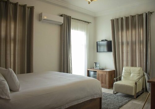 Гостиница Hotel Petit Brussel в Ломе