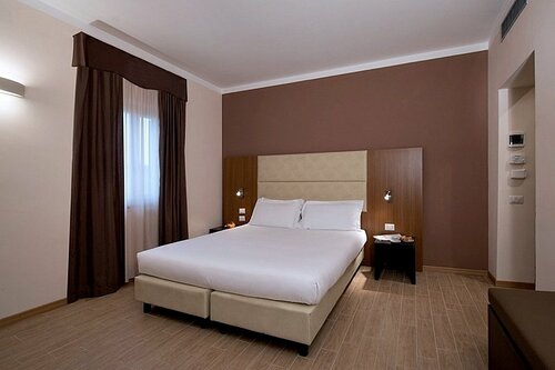 Гостиница Cdh Hotel Villa Ducale в Парме