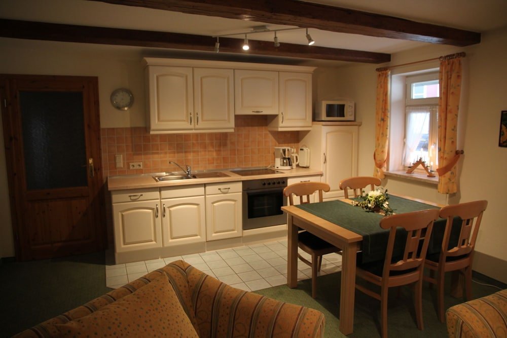 Фото Ferienwohnungen Am Markt