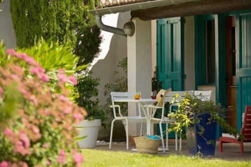 Внешний вид отеля Relais de l'Oustau Camarguen в Ле Гро-дю-Руе, фото 3