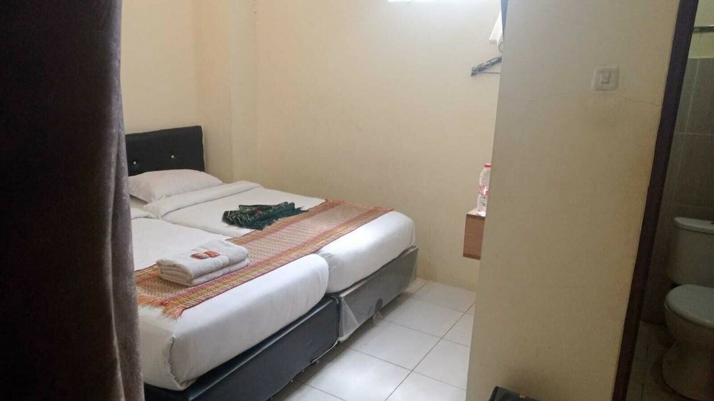 Фото Penginapan Mutiara Syariah