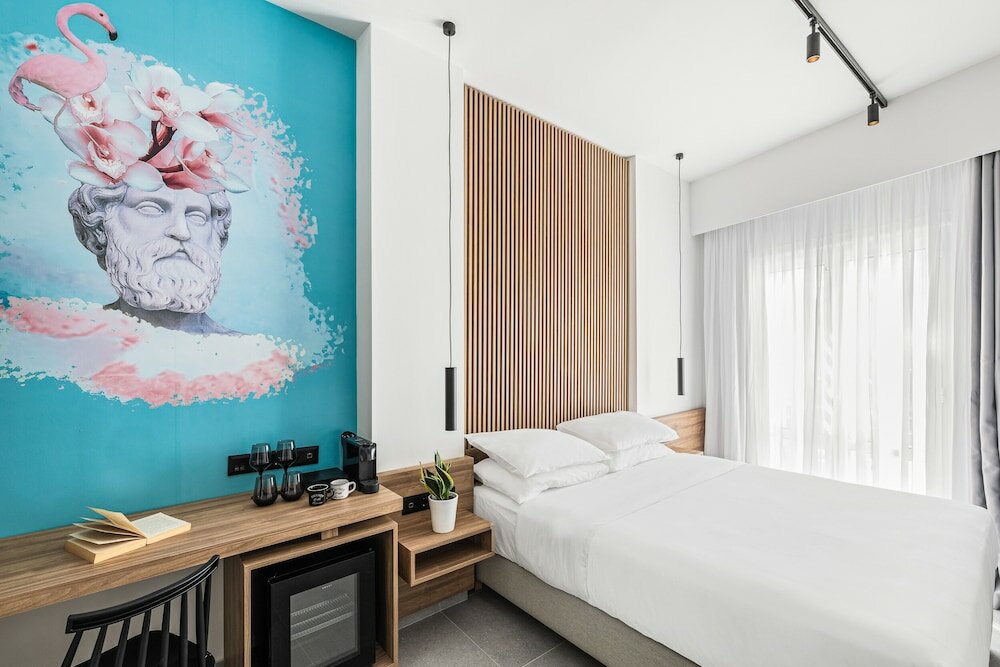 Фото The Q Hotel