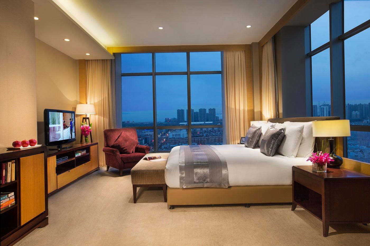 Фото Somerset Grand Central Dalian