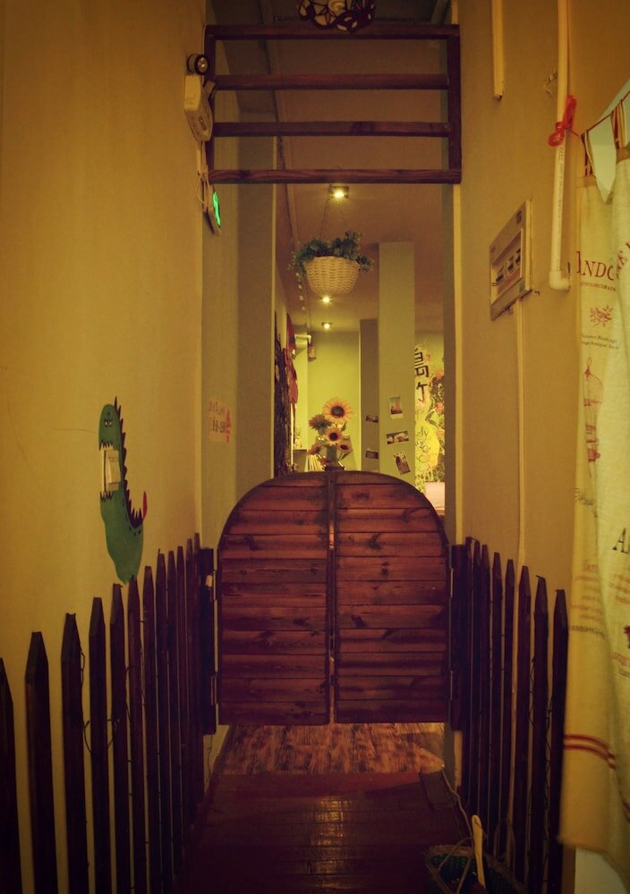 Фото Qingdao Yuezhu Topic Hostel