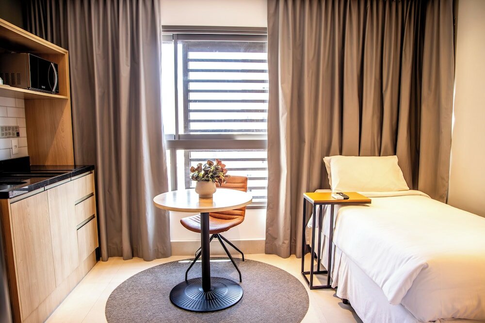 Фото Cozzy Suítes Paraíso Hotel