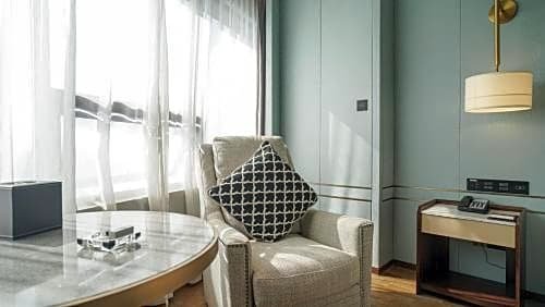 Фото Shaoxing Xianheng Grand Hotel