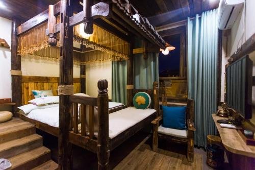 Фото Dielianhua Cowherd Inn Zhangjiajie