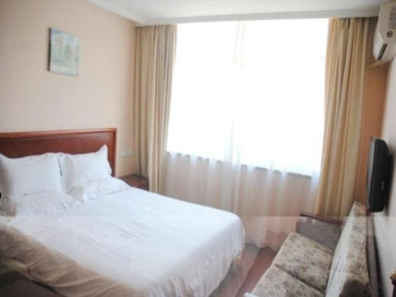 Фото GreenTree Inn Nantong Development Zone Central Avenue Hotel