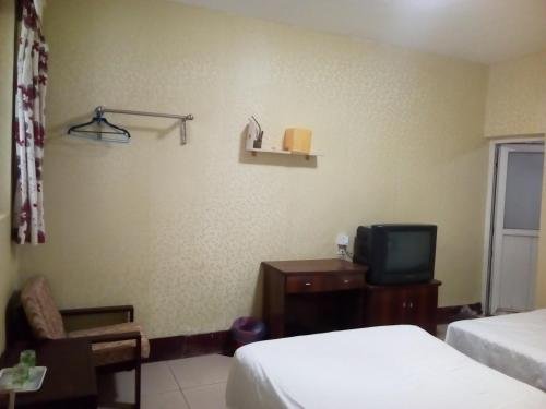 Фото Joysuites Nantong