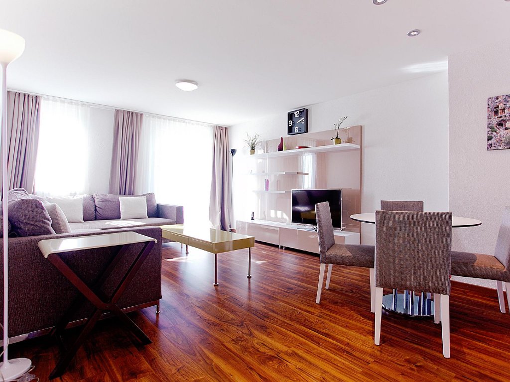 Фото Luxury Apartments by Livingdowntown