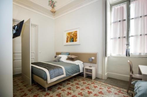 Фото Magione Del Re - Sicilian Rooms