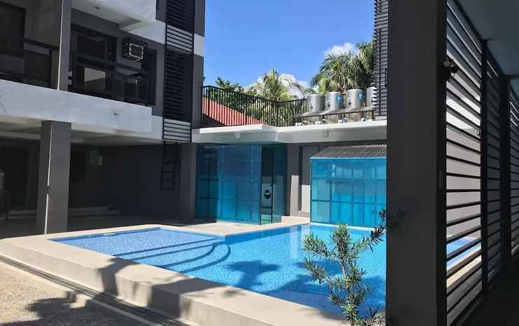 Фото Unwnd Residences Dumaguete