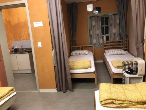 Фото Busan Centum Guesthouse