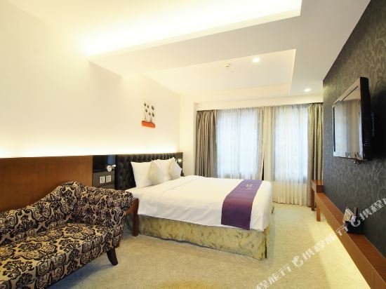 Фото The Bauhinia Hotel - Central