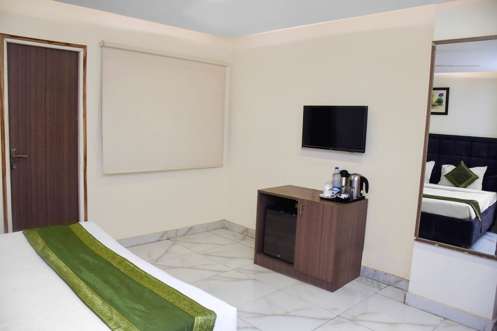 Фото Treebo Trip Metro Inn