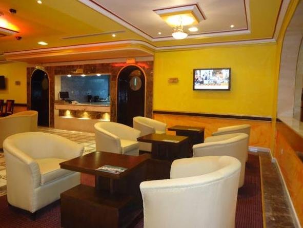 Фото Capital O456 Almansour Grand Hotel