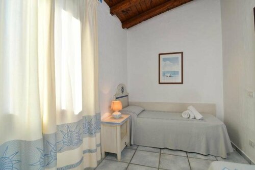 Гостиница Li Suari Club Village в Сардинии