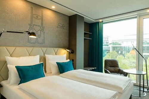 Гостиница Motel One Munich - Parkstadt Schwabing в Мюнхене